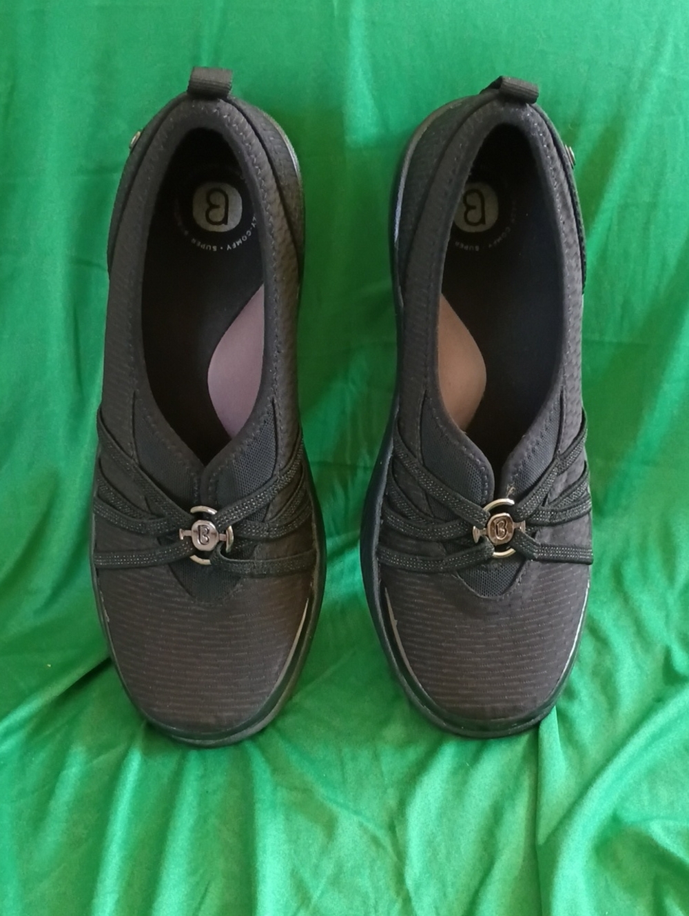 Bzees Women's Black Slip-On Comfort Sneakers with Decorative Emblem